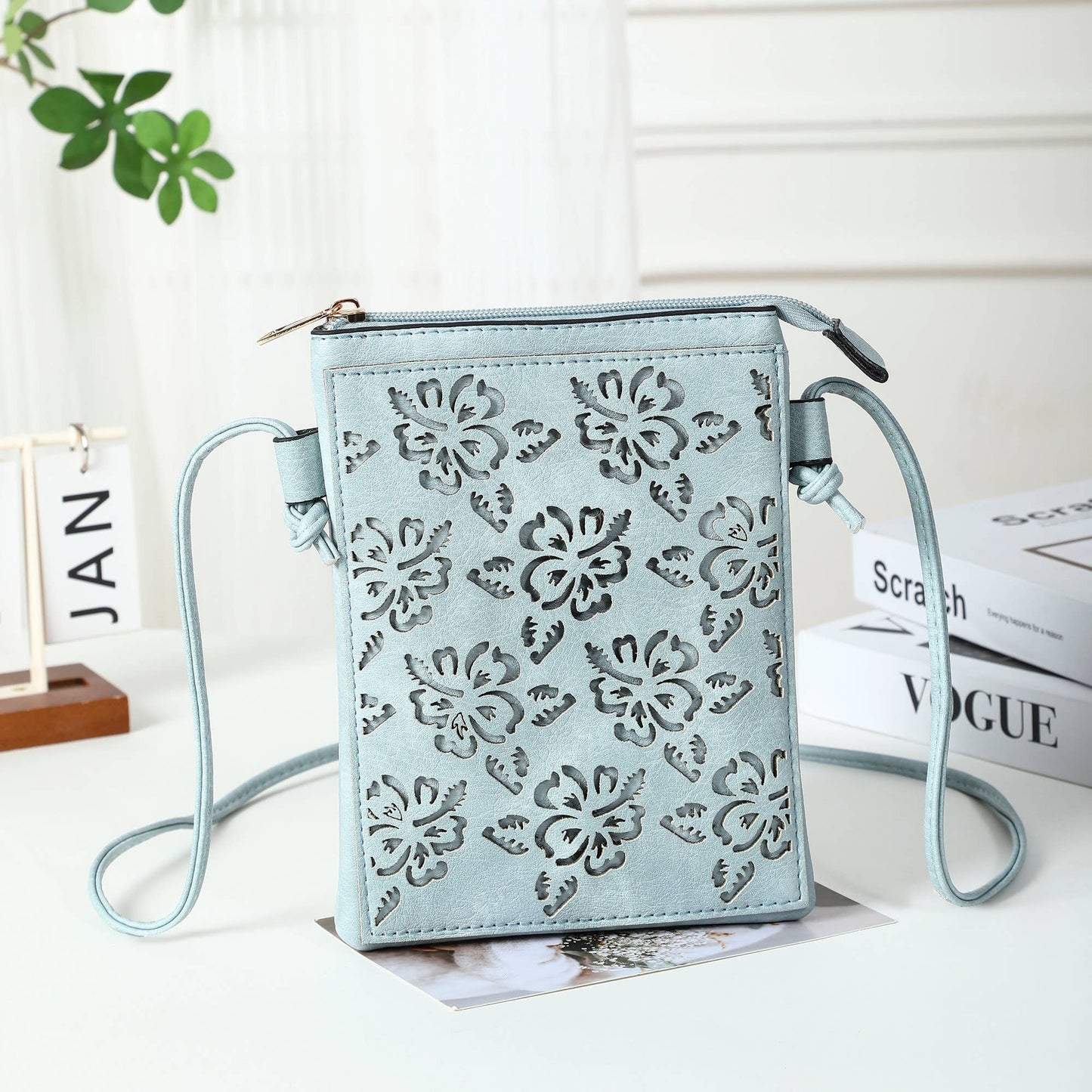 Blue - Hibiscus Lacer cut crossbody cellphone bag