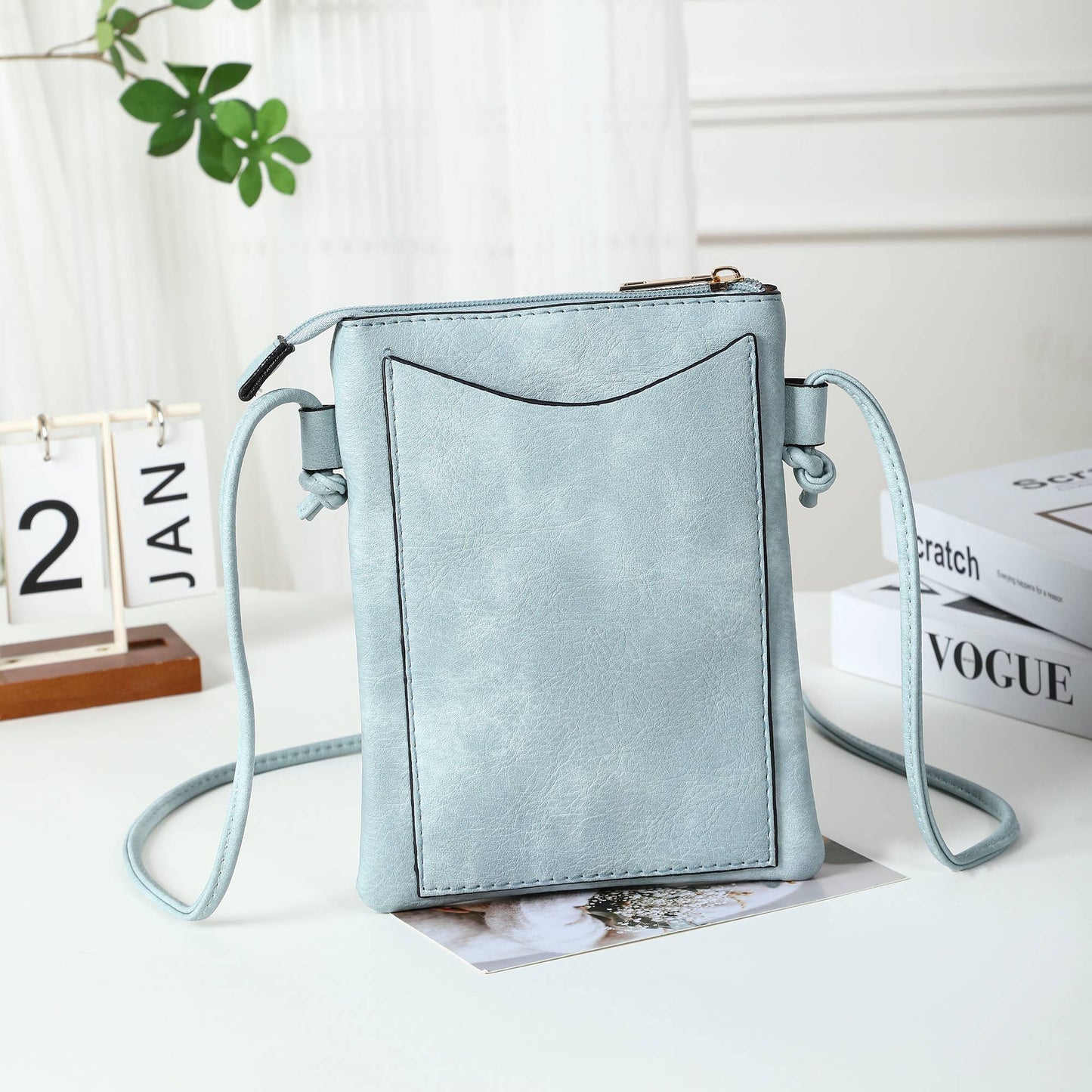Blue - Hibiscus Lacer cut crossbody cellphone bag